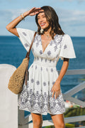 Geblümtes Kurzarm Mini-Strandkleid mit tiefem Ausschnitt