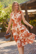 Orange geblümtes Midikleid mit Kragen