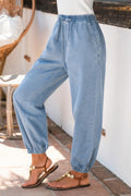 Blaue Jeans mit Kordelzug und Taschen