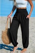Schwarze Stoffhose mit gesmoktem Bund