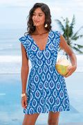 Blaues Minikleid mit tiefem Ausschnitt und Ornament-Muster