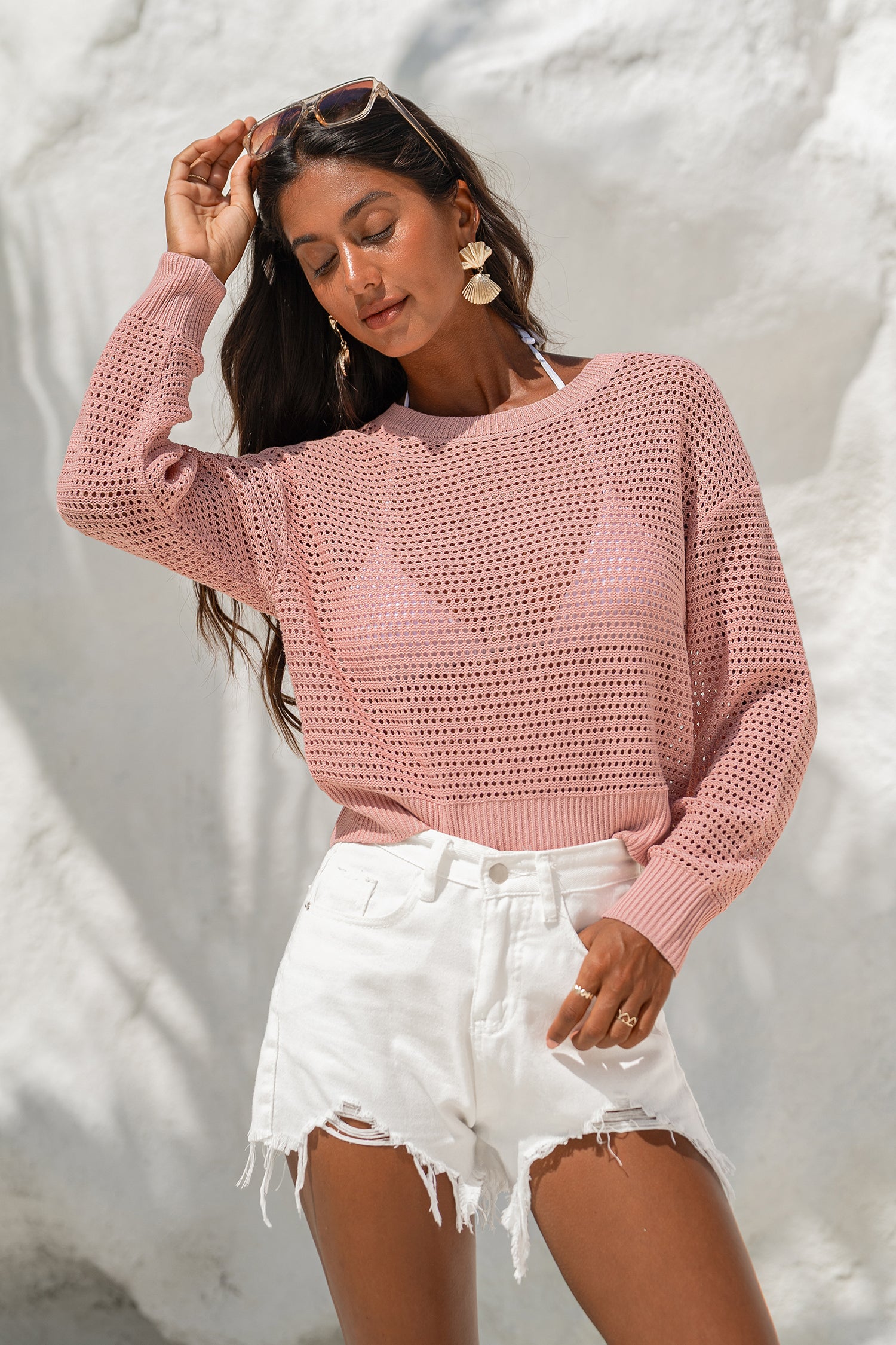 Rosa Langarmpullover mit Karomuster