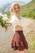 Beiger Minirock mit gesmokter Taille
