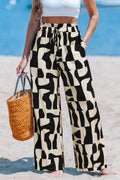 Stoffhose mit abstraktem Muster und Paperbag-Bund
